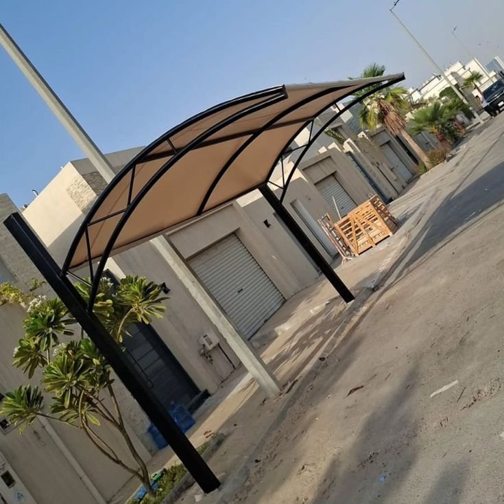 تصميم مظلات سيارات حسب مساحة الموقف
